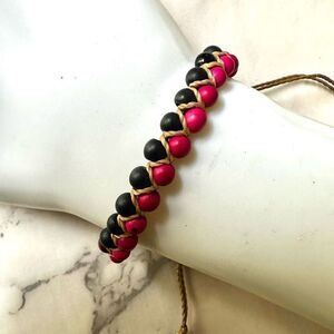 Pink and black seed bracelet